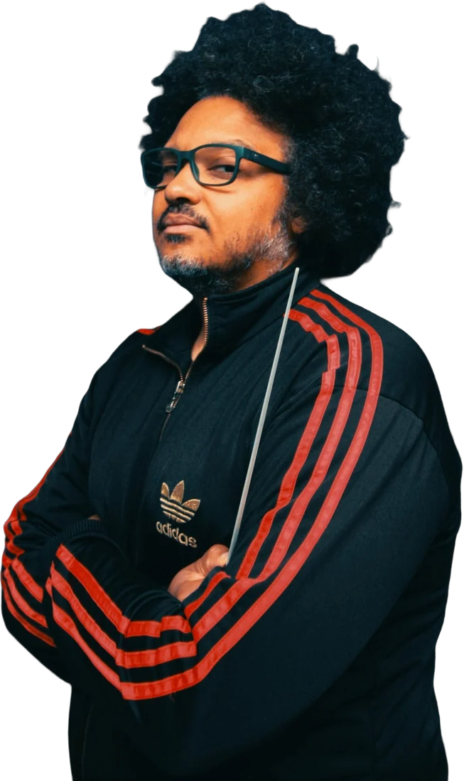 Gudu Lopes as his conductor persona Innah Chill Do, arms crossed and holding a baton
